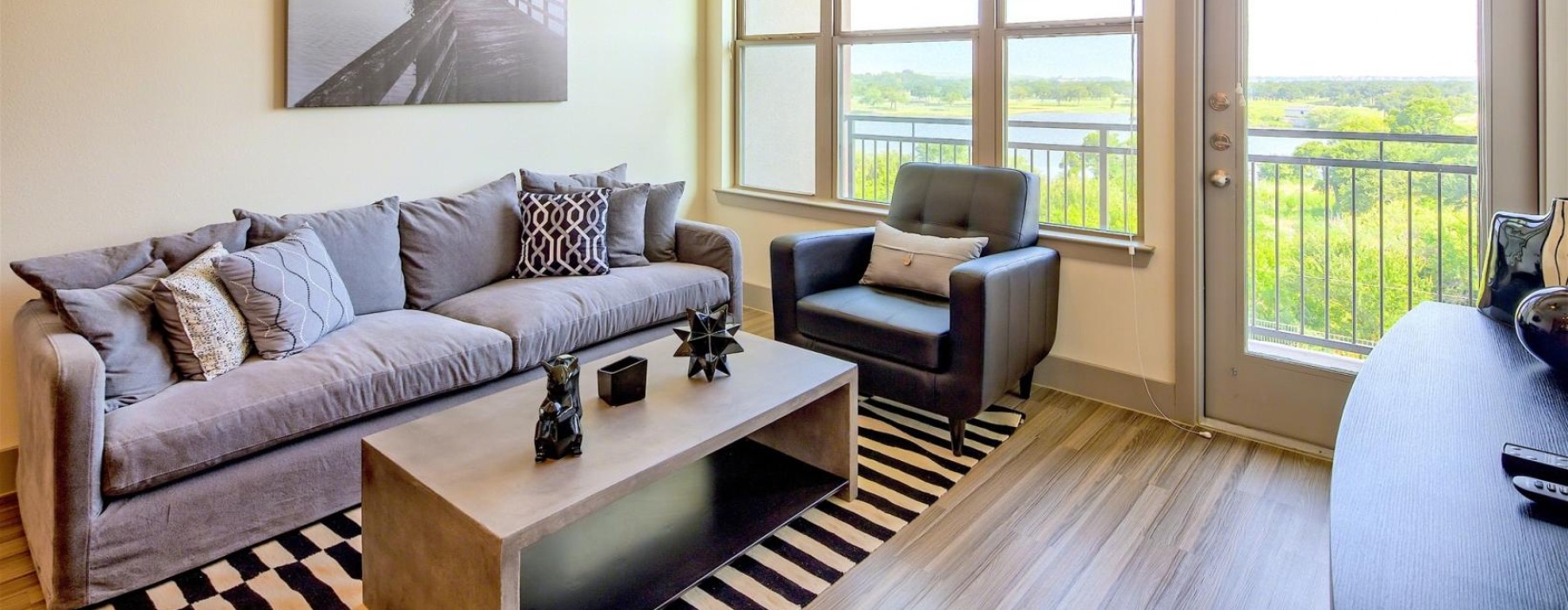 a living room with a large glass door